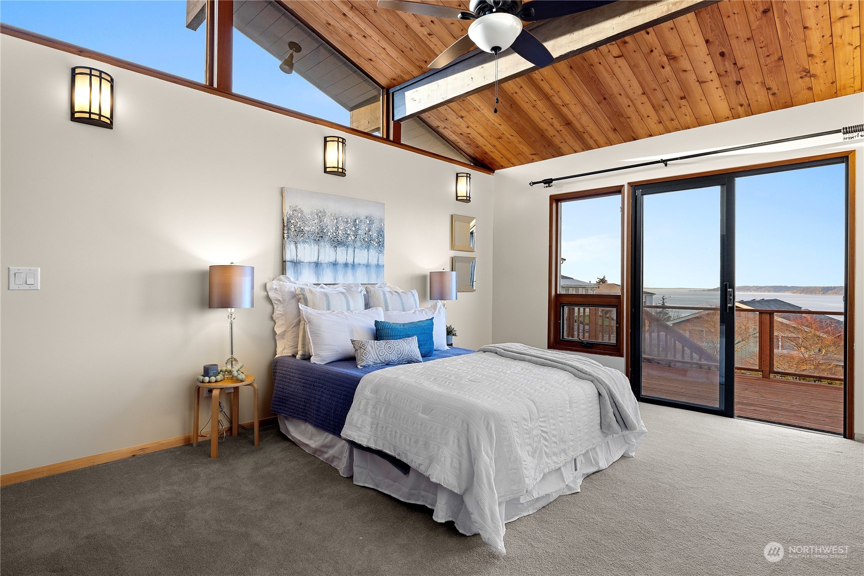 29832 2nd Place Southwest Federal Way, WA 98023 - Photo 16 of 40 a spacious bedroom with a bed and large windows