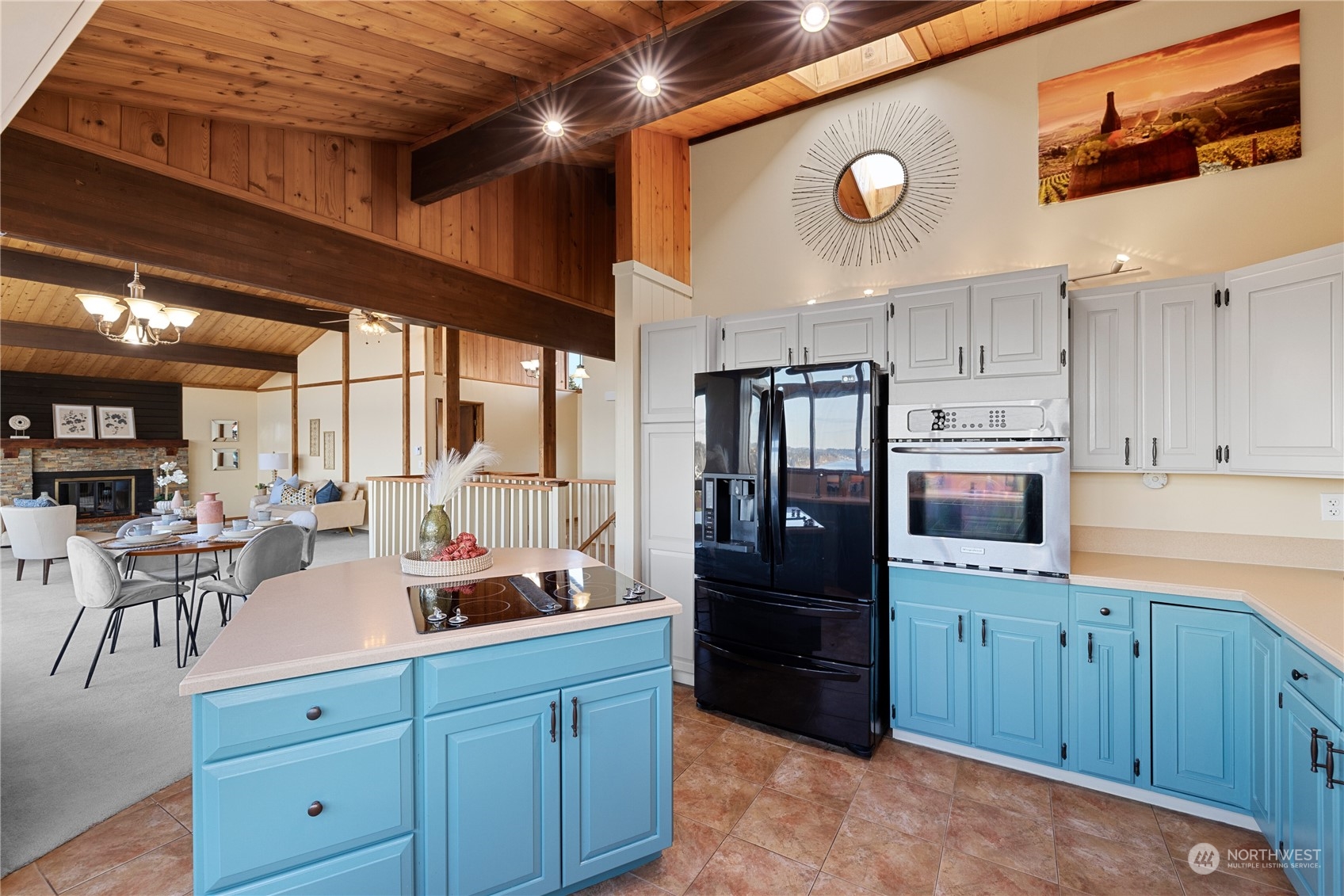 29832 2nd Place Southwest Federal Way, WA 98023 - Photo 5 of 40 a kitchen with a refrigerator and a stove top oven
