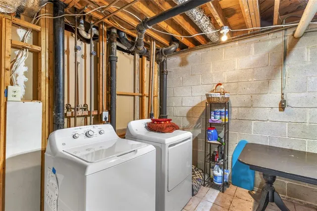 a bathroom with a sink and mirror with toilet