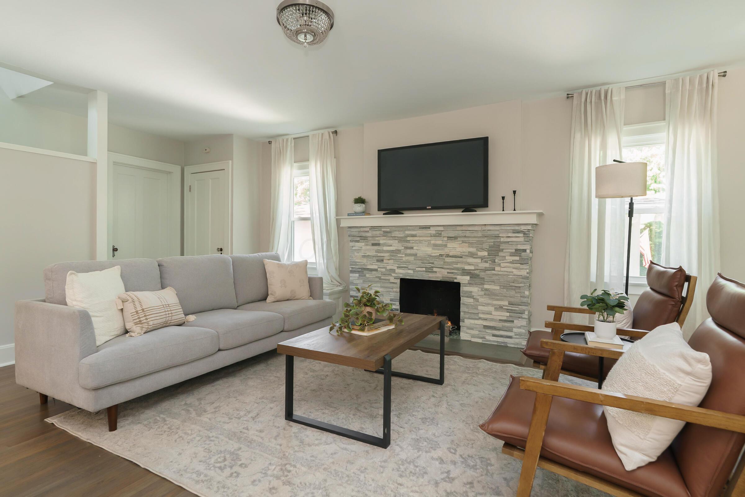 163 Garden Road Columbus, OH 43214 - Photo 8 of 46 A beautiful gas log fireplace with mantel sets the stage in this delightful living room.