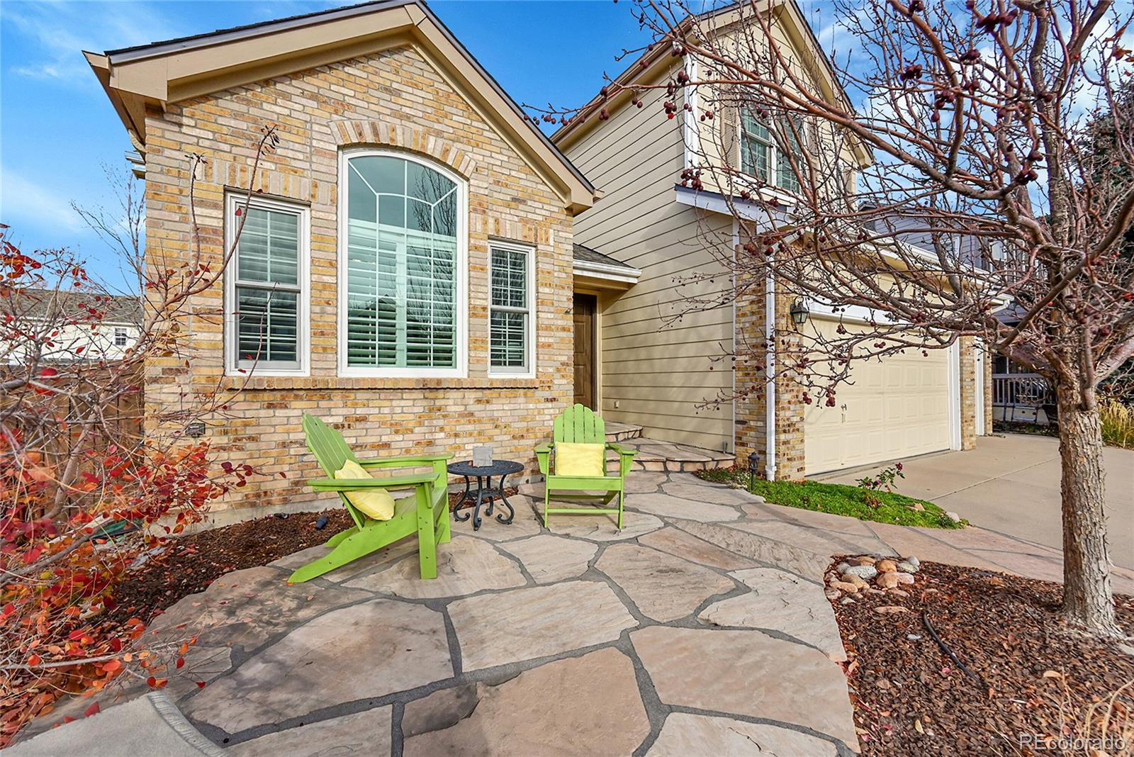 9424 South Hackberry Lane Highlands Ranch, CO 80129 - Photo 2 of 47 a view of house with outdoor seating space