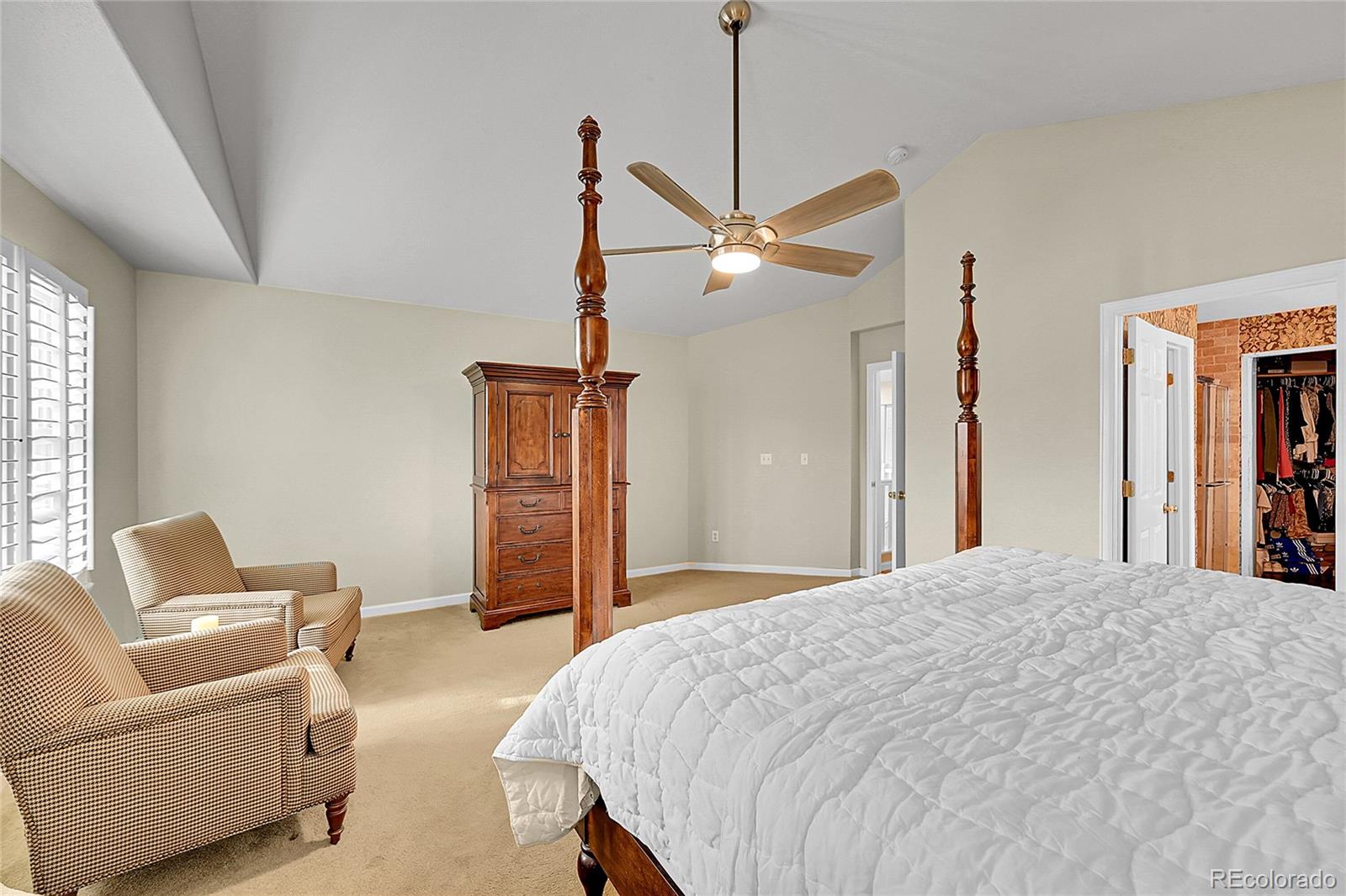 9424 South Hackberry Lane Highlands Ranch, CO 80129 - Photo 22 of 47 a bedroom with a bed furniture and a window
