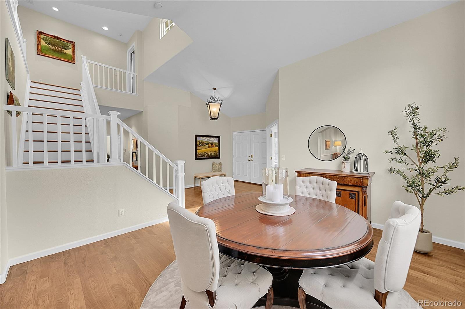 9424 South Hackberry Lane Highlands Ranch, CO 80129 - Photo 5 of 47 a view of a dining room with furniture