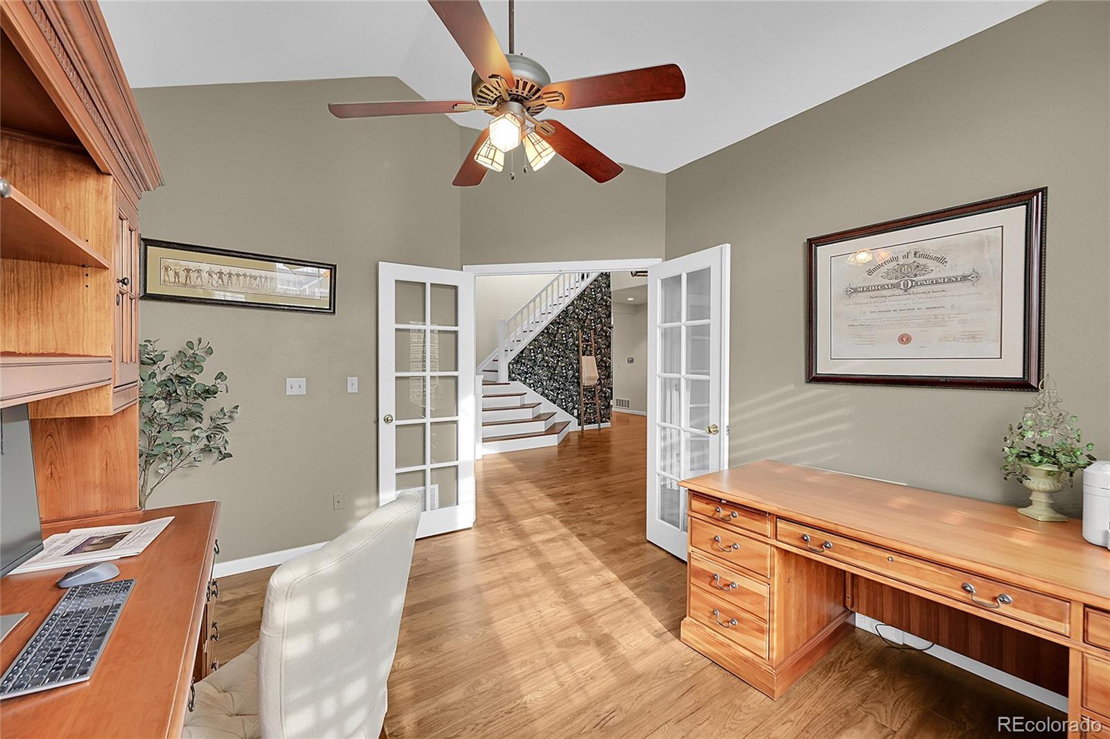 9424 South Hackberry Lane Highlands Ranch, CO 80129 - Photo 8 of 47 a view of livingroom with furniture and ceiling fan