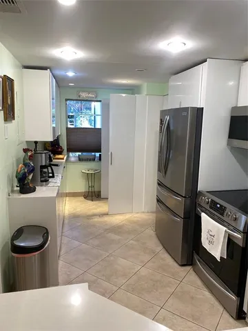 a view of a living room with a bed