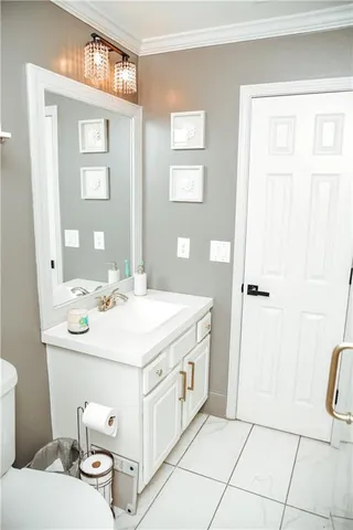 a utility room with a sink dryer and washer