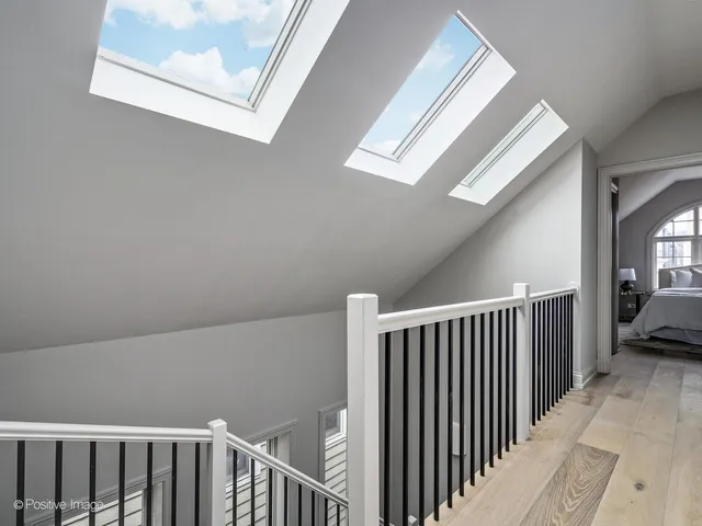 a view of a hallway with windows