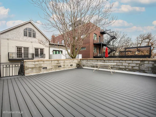 a view of a house with roof deck