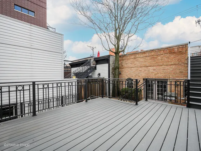 a view of a house with a roof deck