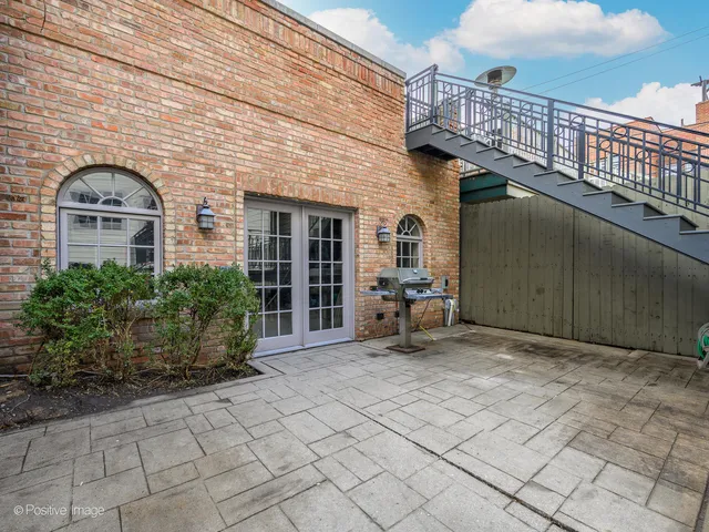 a view of a terrace with sitting area