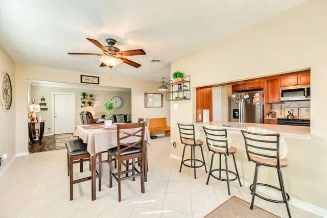 a view of a dining room with furniture