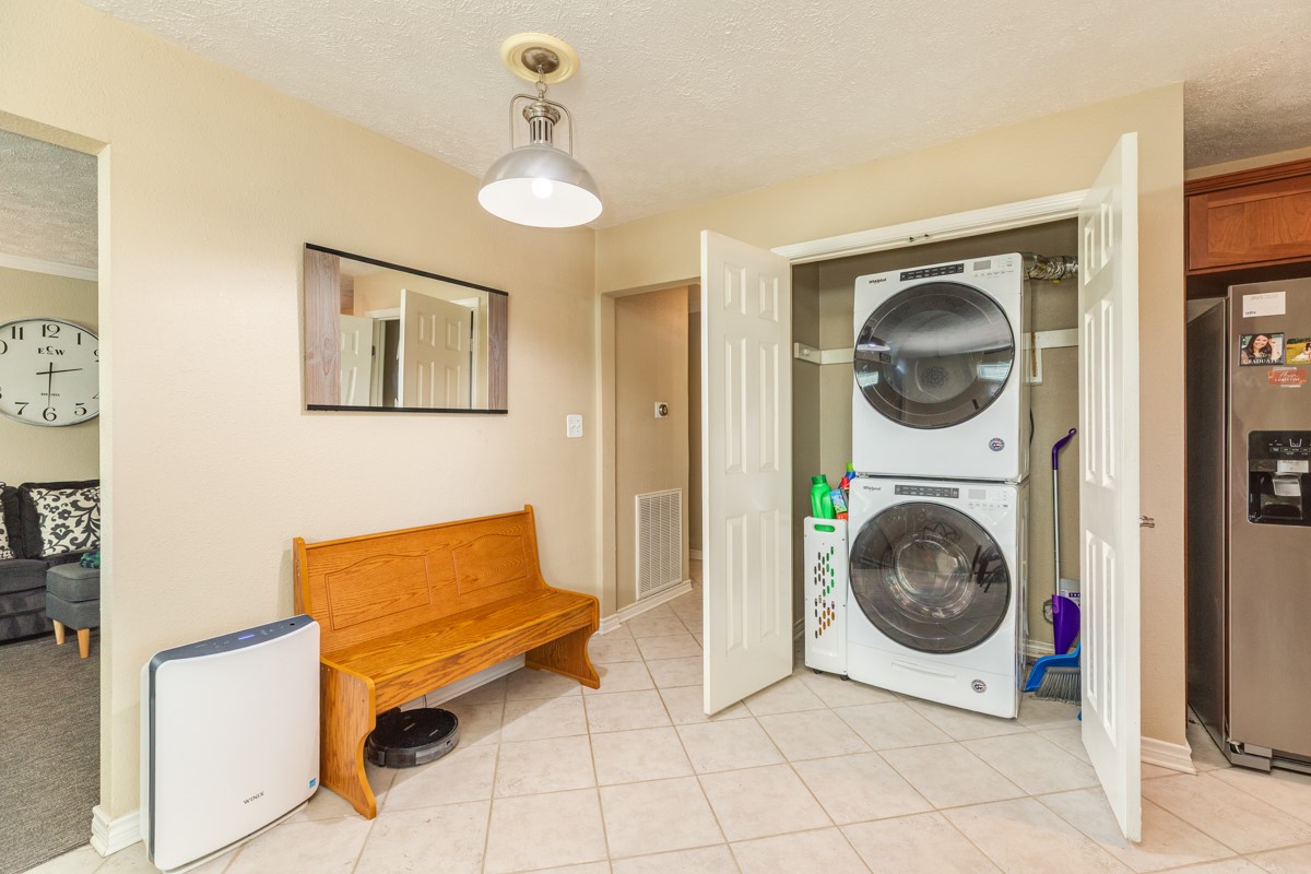 820 Perry Street Angleton, TX 77515 - Photo 20 of 26 a view of a livingroom with washer and dryer