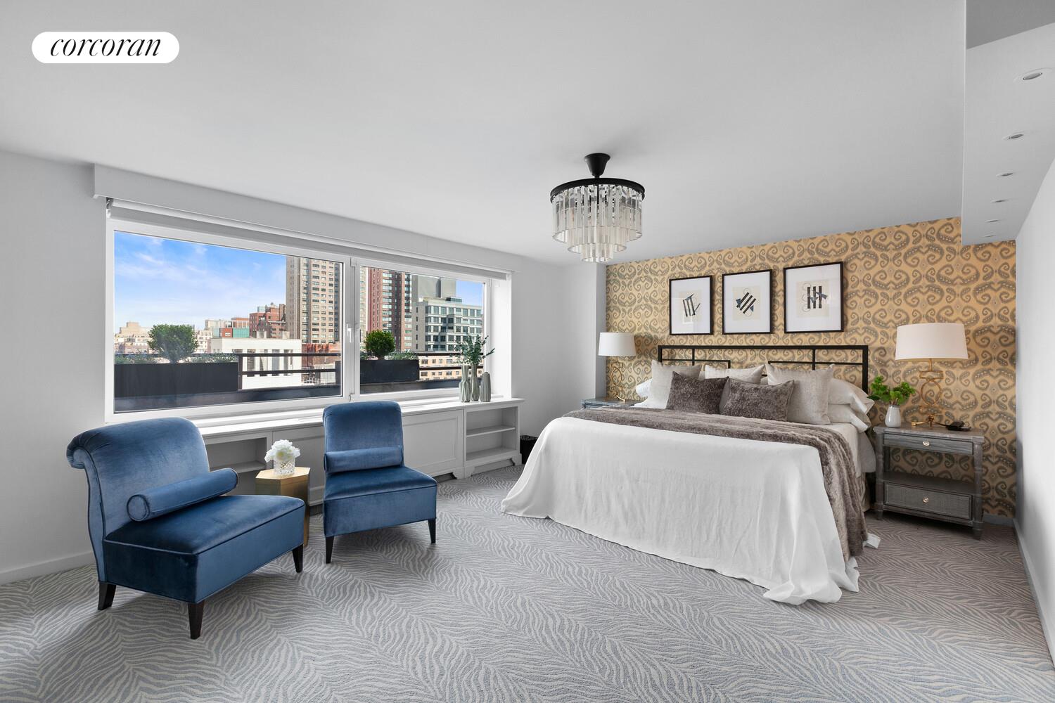 505 East 79th Street, Unit 19B Manhattan, NY 10075 - Photo 7 of 19 a bedroom with bed and a large window