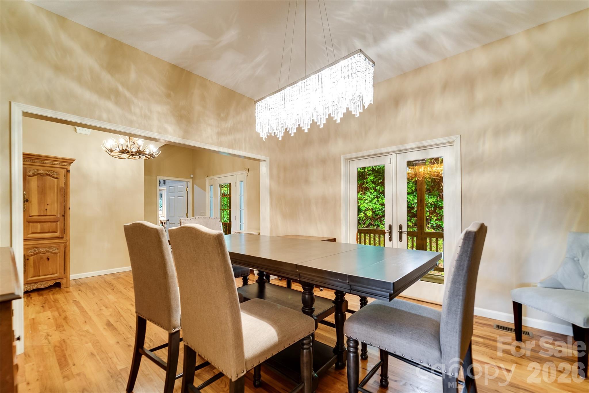 1838 Coman Road Franklin, NC 28734 - Photo 17 of 48 a view of a dining room with furniture window and wooden floor