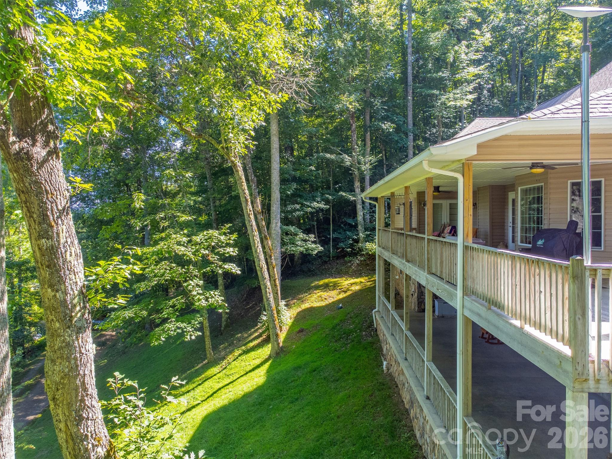 1838 Coman Road Franklin, NC 28734 - Photo 5 of 48 a view of a house with a yard