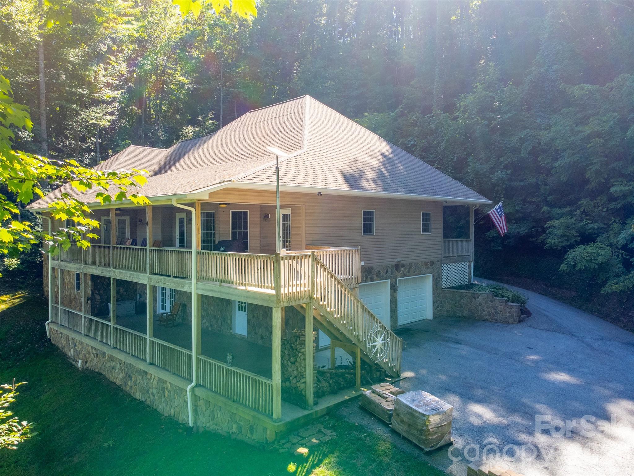 1838 Coman Road Franklin, NC 28734 - Photo 7 of 48 a view of a house with a backyard