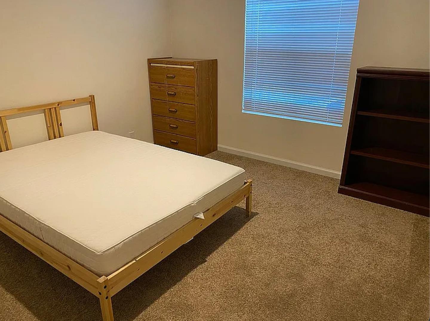 1075 Space Park Way, Unit 134 Mountain View, CA 94043 - Photo 9 of 9 a bedroom with a bed and dresser