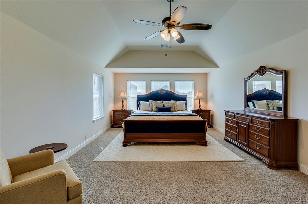 4014 Grove Valley Road Midlothian, TX 76065 - Photo 2 of 7 a bedroom with a bed and window