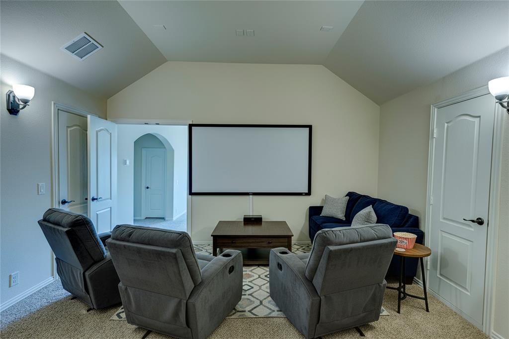 4014 Grove Valley Road Midlothian, TX 76065 - Photo 4 of 7 a living room with furniture and a lamp