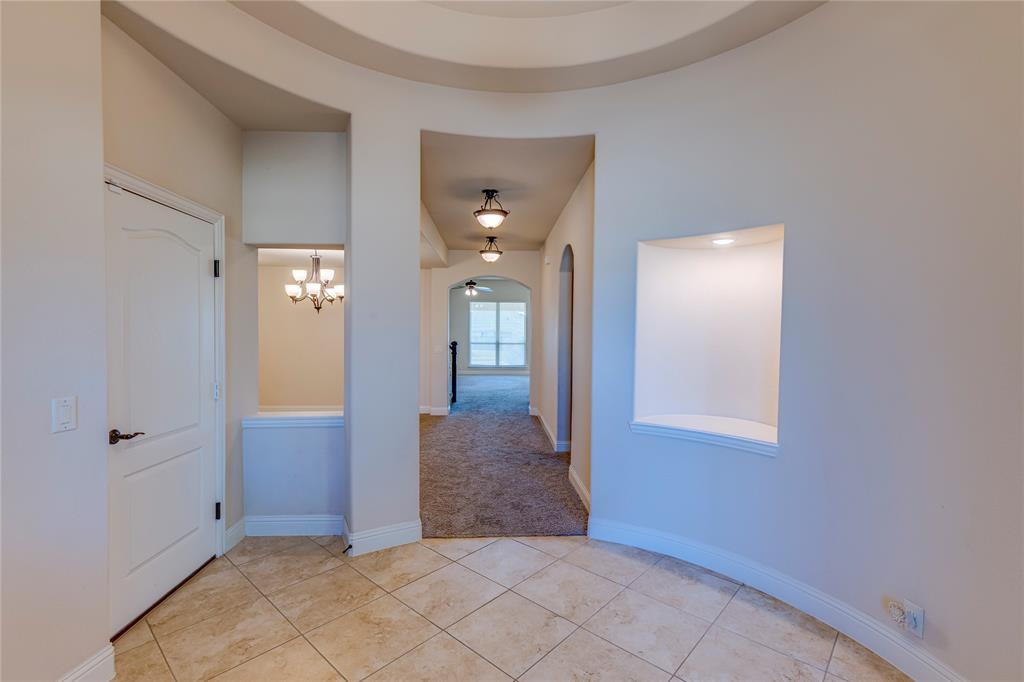 4014 Grove Valley Road Midlothian, TX 76065 - Photo 7 of 7 an empty room with windows and entrance