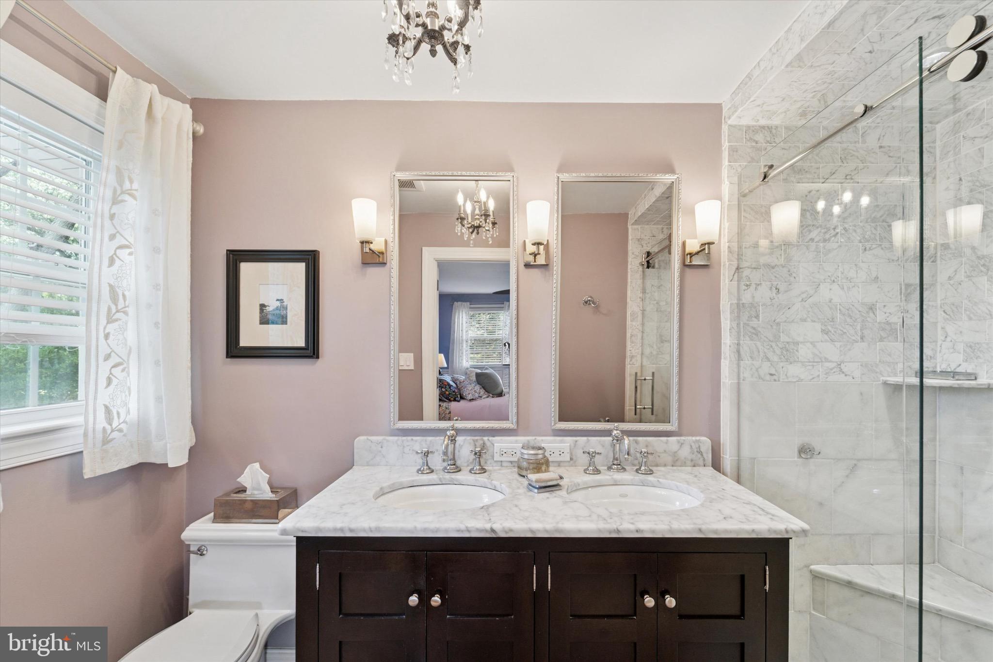 131 Brookmead Road Wayne, PA 19087 - Photo 13 of 28 a bathroom with a granite countertop sink and a mirror