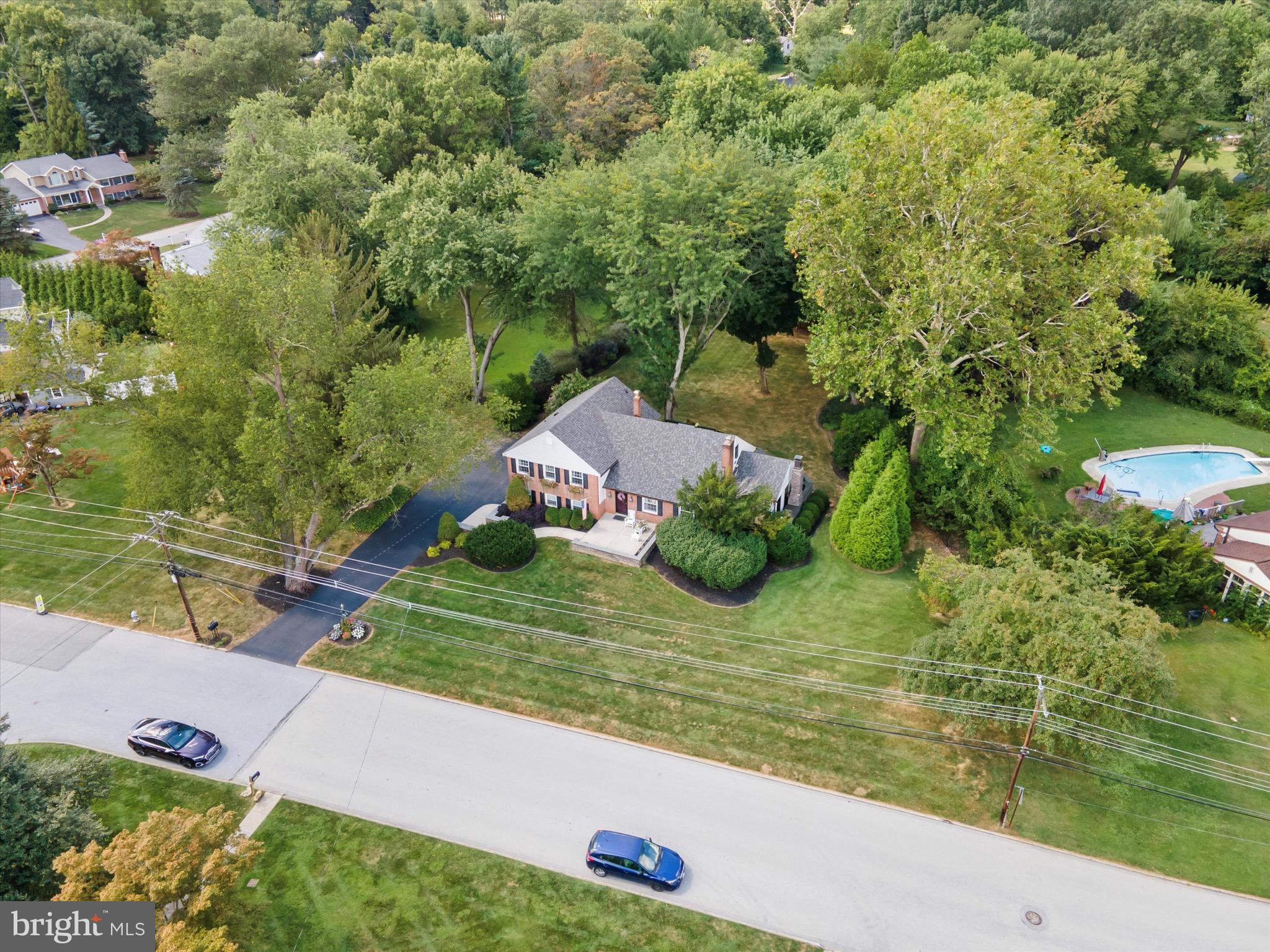 131 Brookmead Road Wayne, PA 19087 - Photo 22 of 28 a view of a lake from a yard