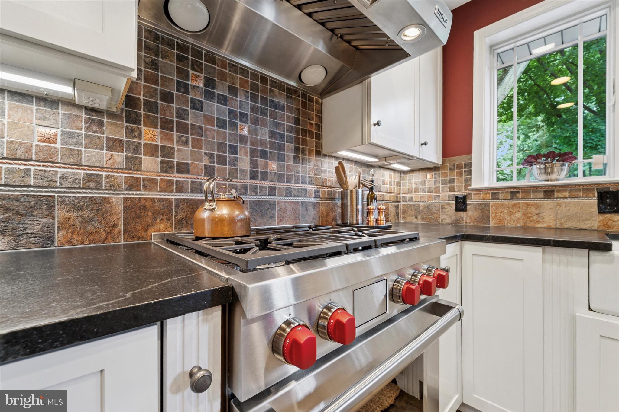 131 Brookmead Road Wayne, PA 19087 - Photo 6 of 28 a kitchen with a stove and a sink
