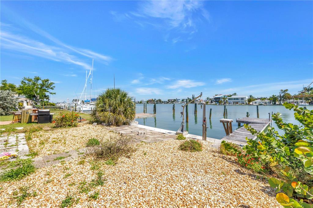 14045 East Parsley Drive Madeira Beach, FL 33708 - Photo 3 of 14 a street view with ocean view