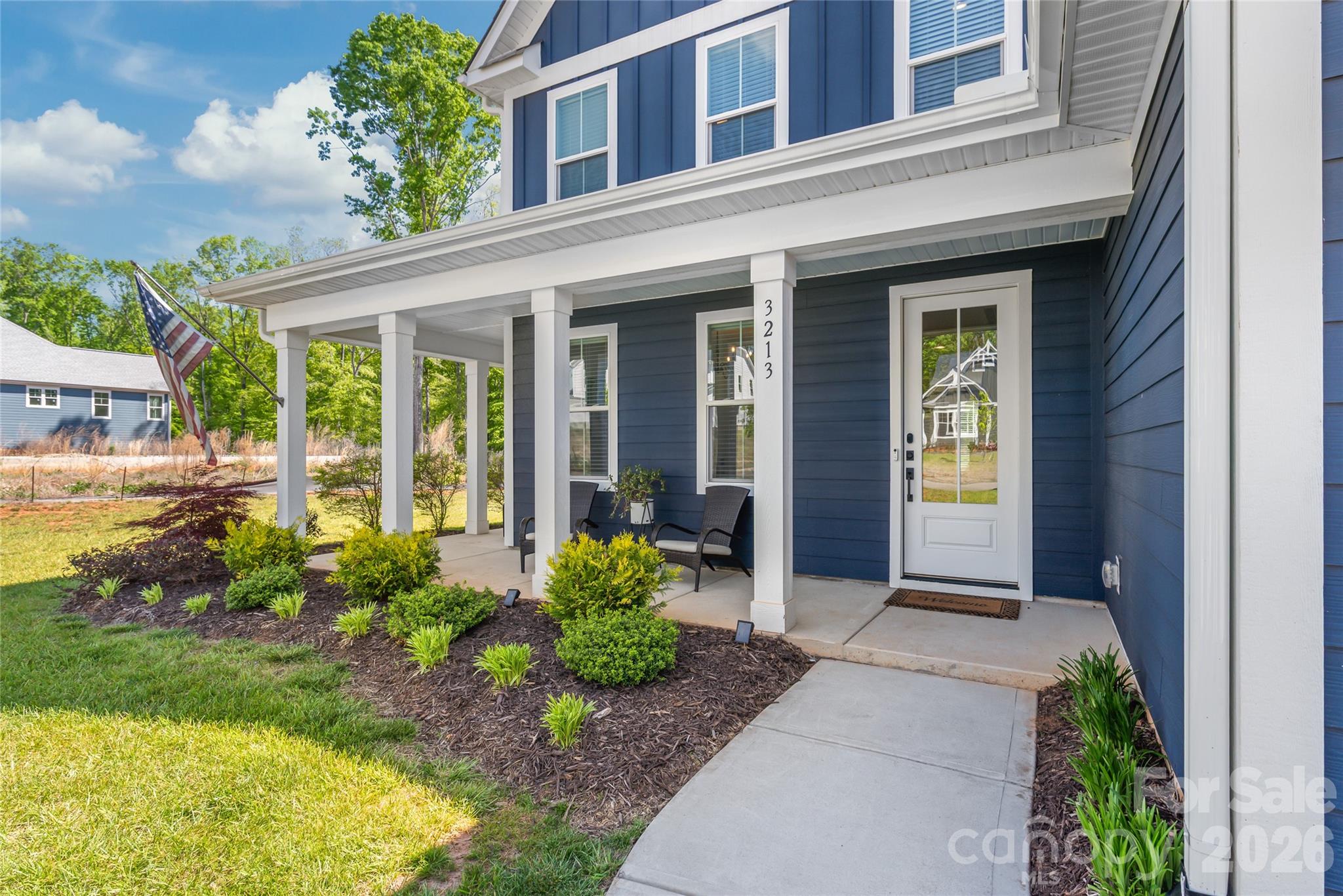 3213 Timber Run Lane Maiden, NC 28650 - Photo 5 of 47 front view of a house with a yard