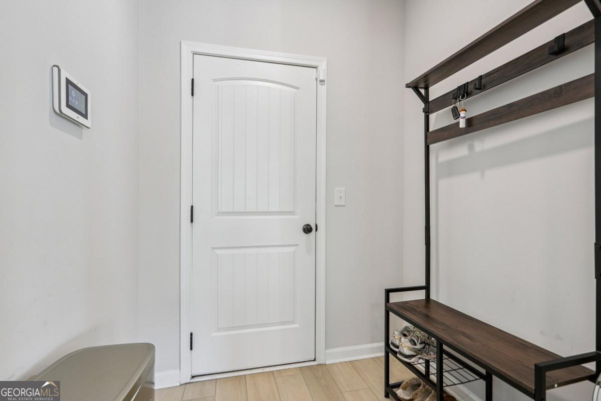 4774 Sultana Way Atlanta, GA 30331 - Photo 12 of 25 a view of room with window and wooden floor