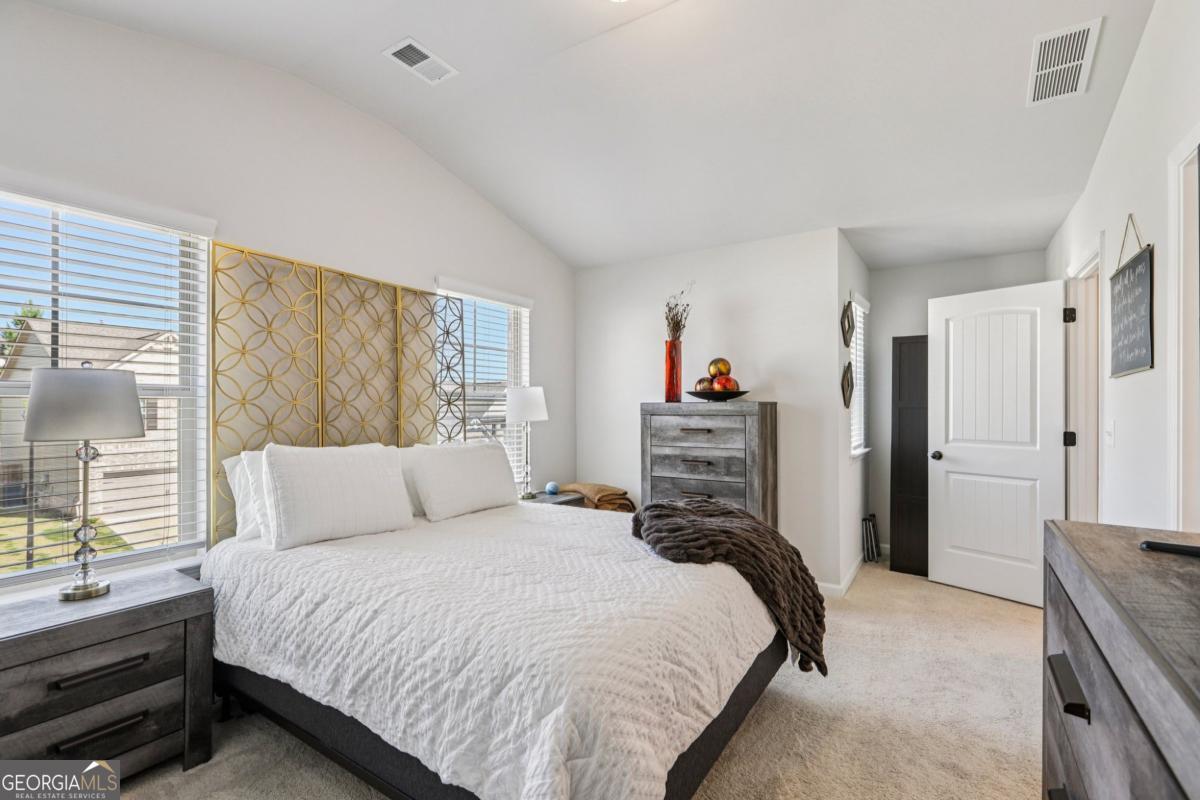 4774 Sultana Way Atlanta, GA 30331 - Photo 21 of 25 a bedroom with a bed and a closet