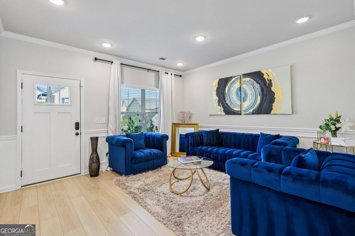 4774 Sultana Way Atlanta, GA 30331 - Photo 3 of 25 a living room with furniture and a large window