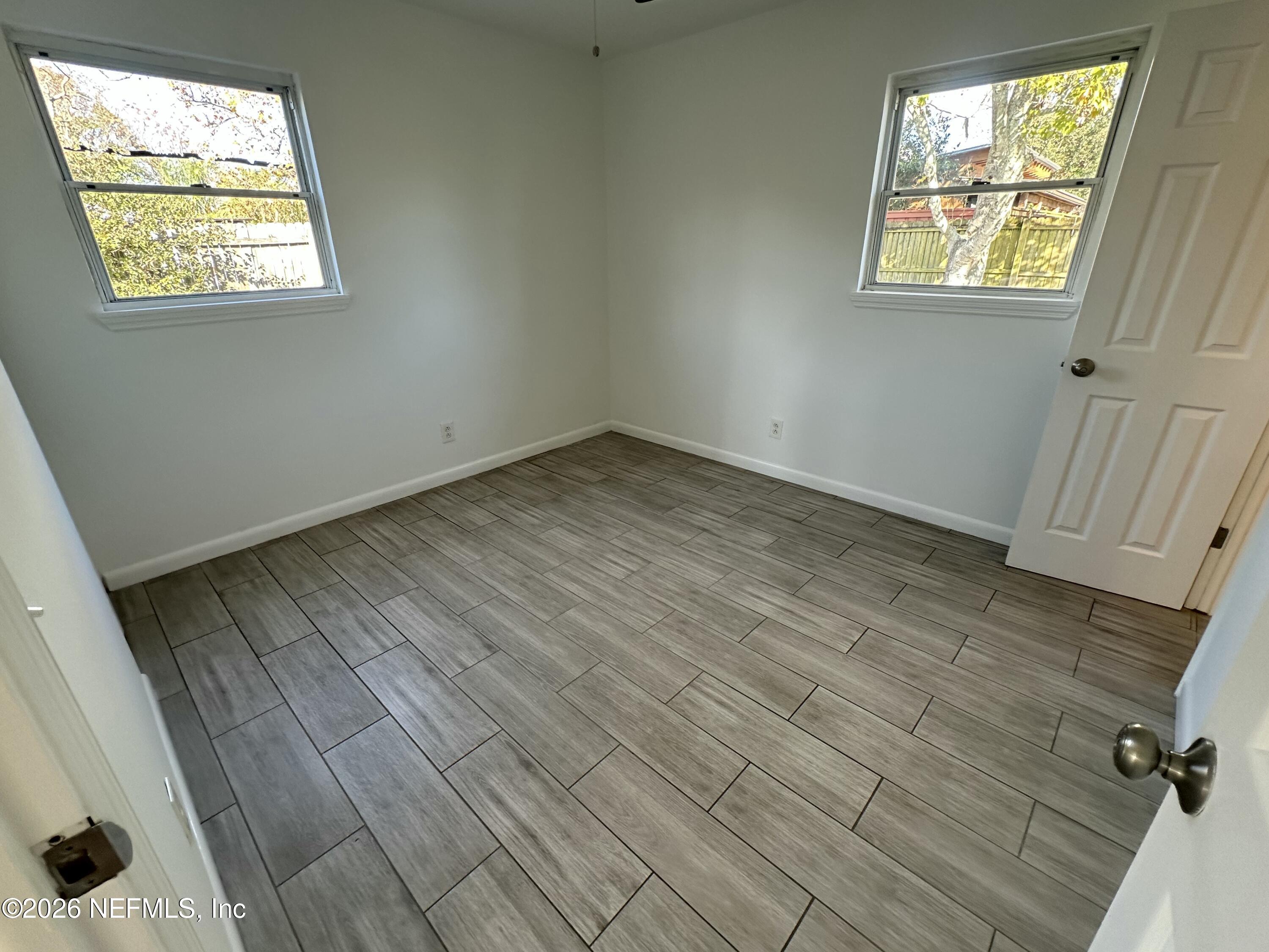 365 Sargo Road Atlantic Beach, FL 32233 - Photo 16 of 23 an empty room with a window