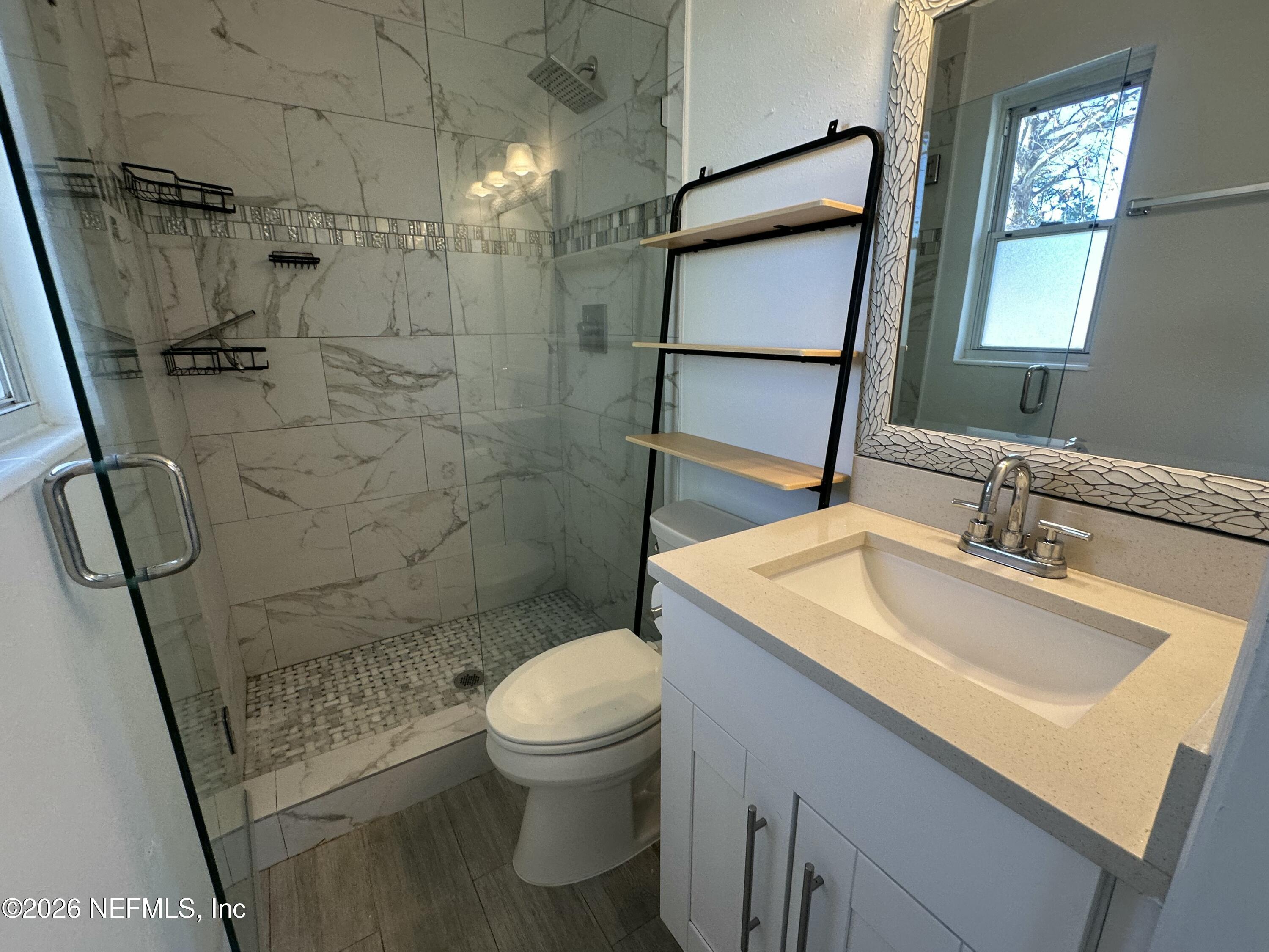 365 Sargo Road Atlantic Beach, FL 32233 - Photo 18 of 23 a bathroom with a sink toilet and shower