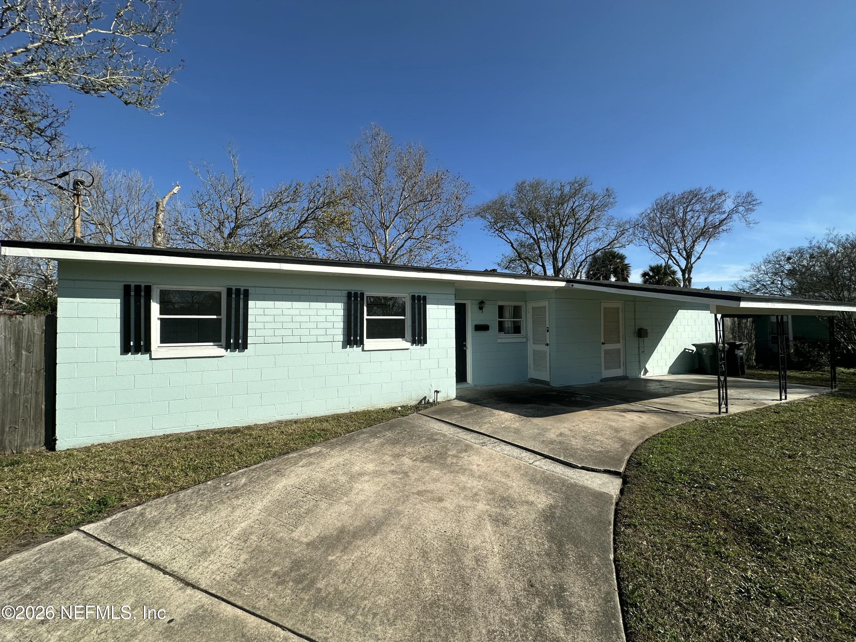 365 Sargo Road Atlantic Beach, FL 32233 - Photo 2 of 23 a view of a house with a backyard