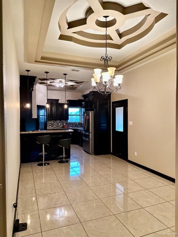 3017 Colorado Avenue McAllen, TX 78504 - Photo 5 of 20 a view of kitchen with furniture and chandelier