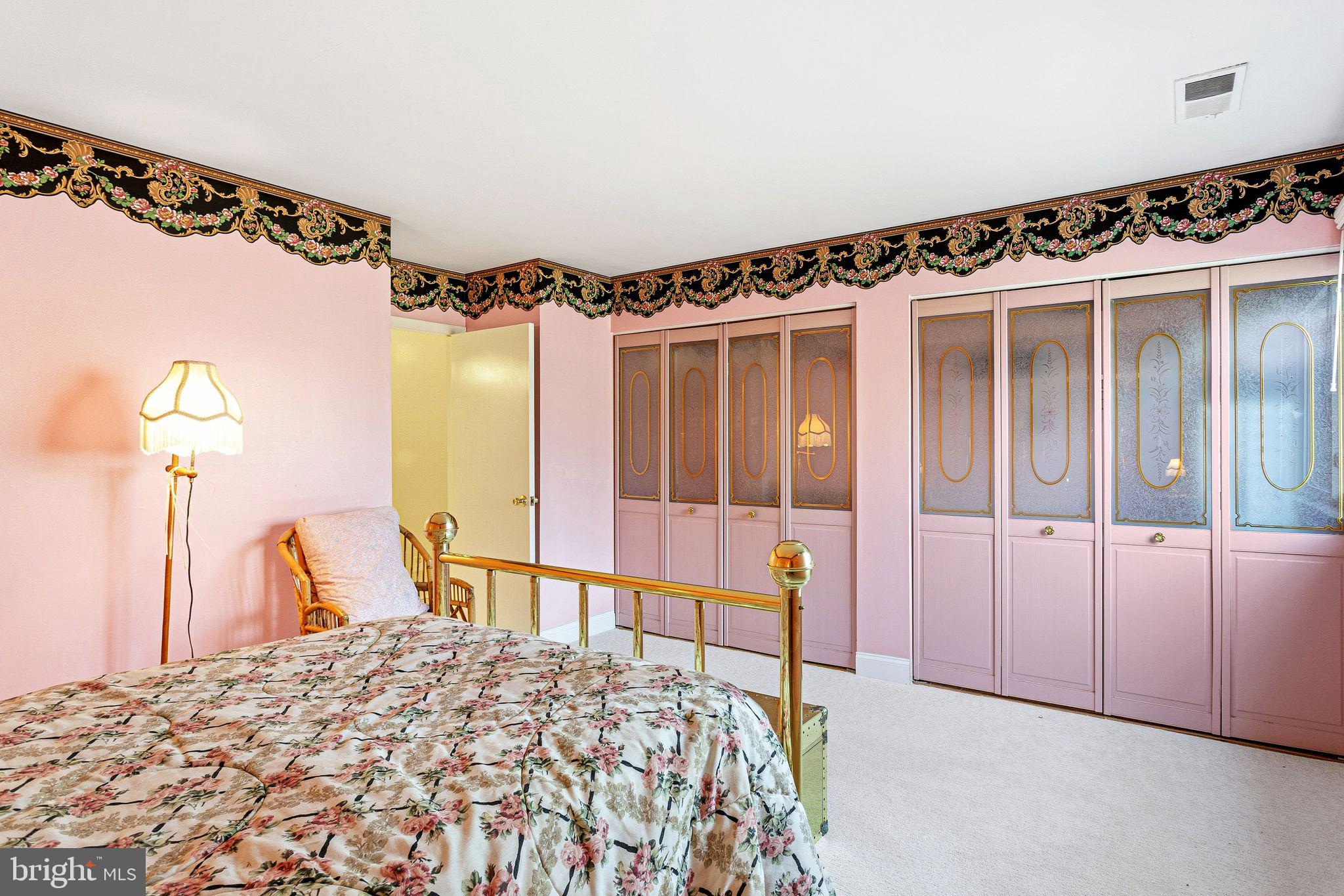 115 East Kings Highway, Unit 271 Maple Shade, NJ 08052 - Photo 11 of 14 a bedroom with a bed and a large mirror