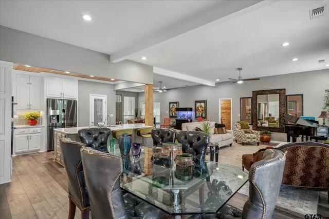 a view of a dining room with furniture
