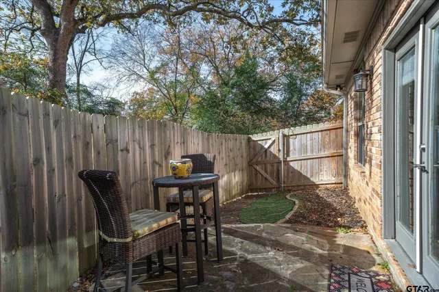 a view of a backyard with plants
