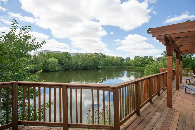 a view of a lake from a balcony