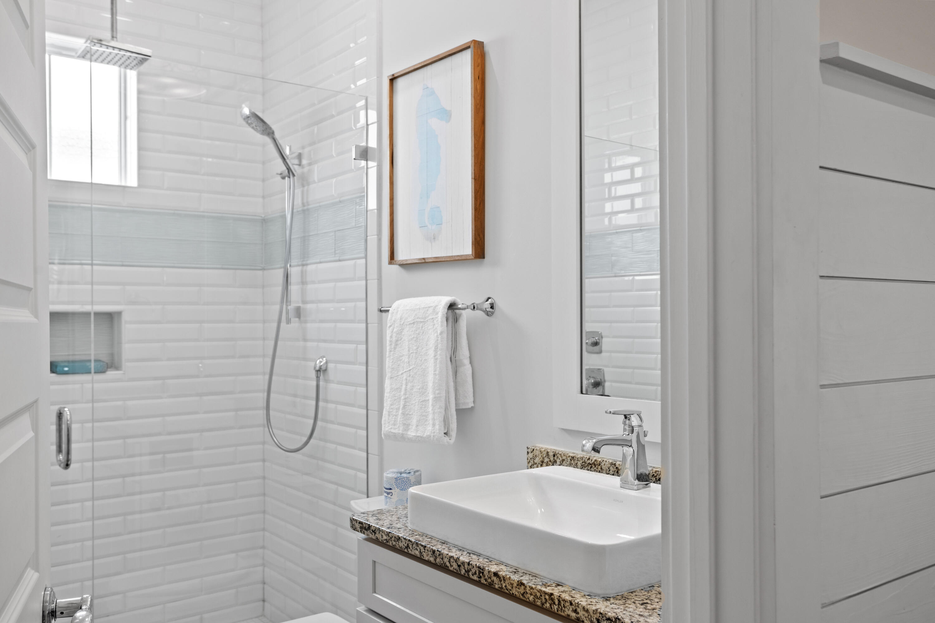 14 The Heron Cove Inlet Beach, FL 32461 - Photo 14 of 56 a bathroom with a sink and a mirror