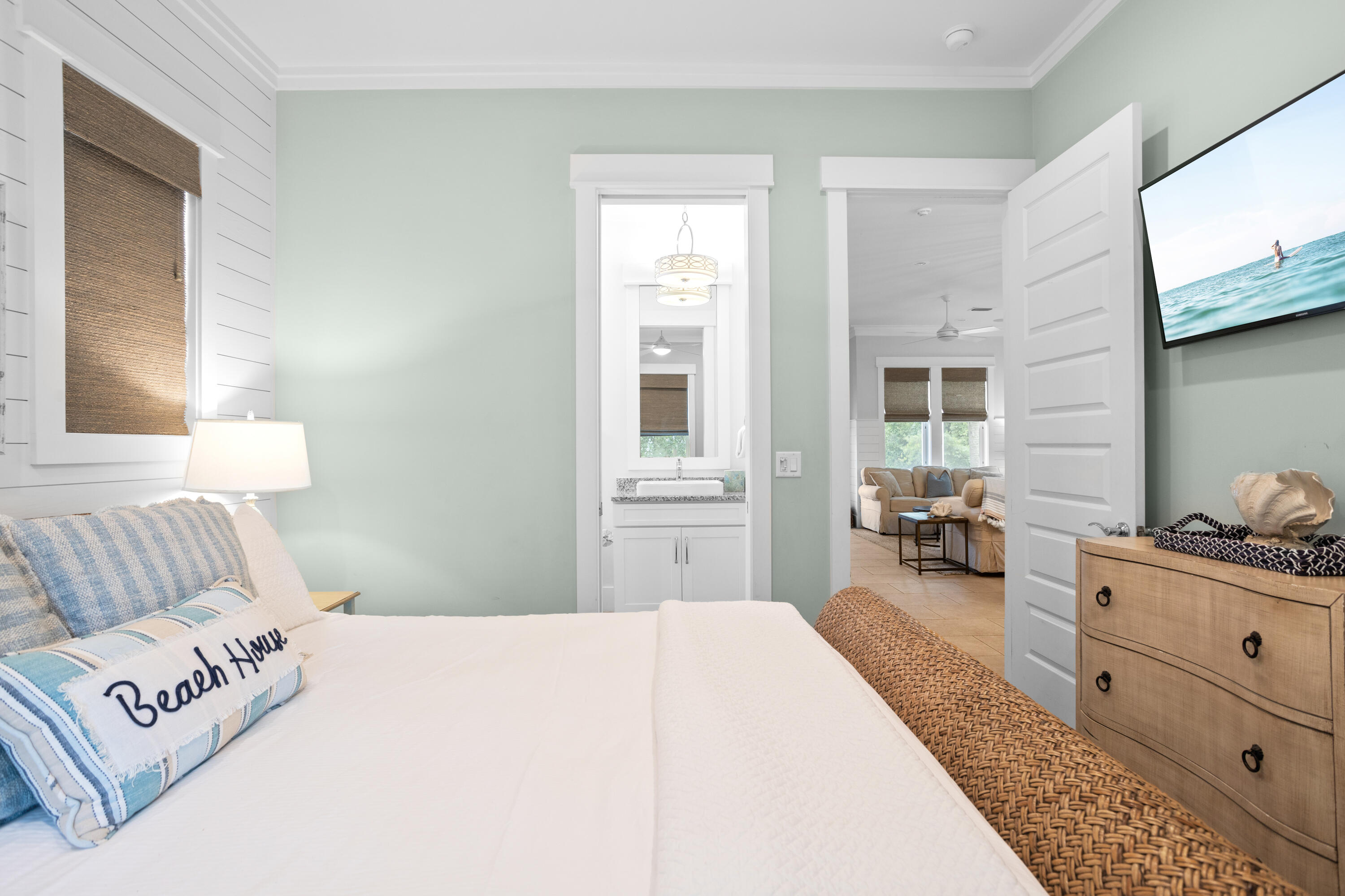 14 The Heron Cove Inlet Beach, FL 32461 - Photo 16 of 56 a bedroom with a bed a couch and dresser