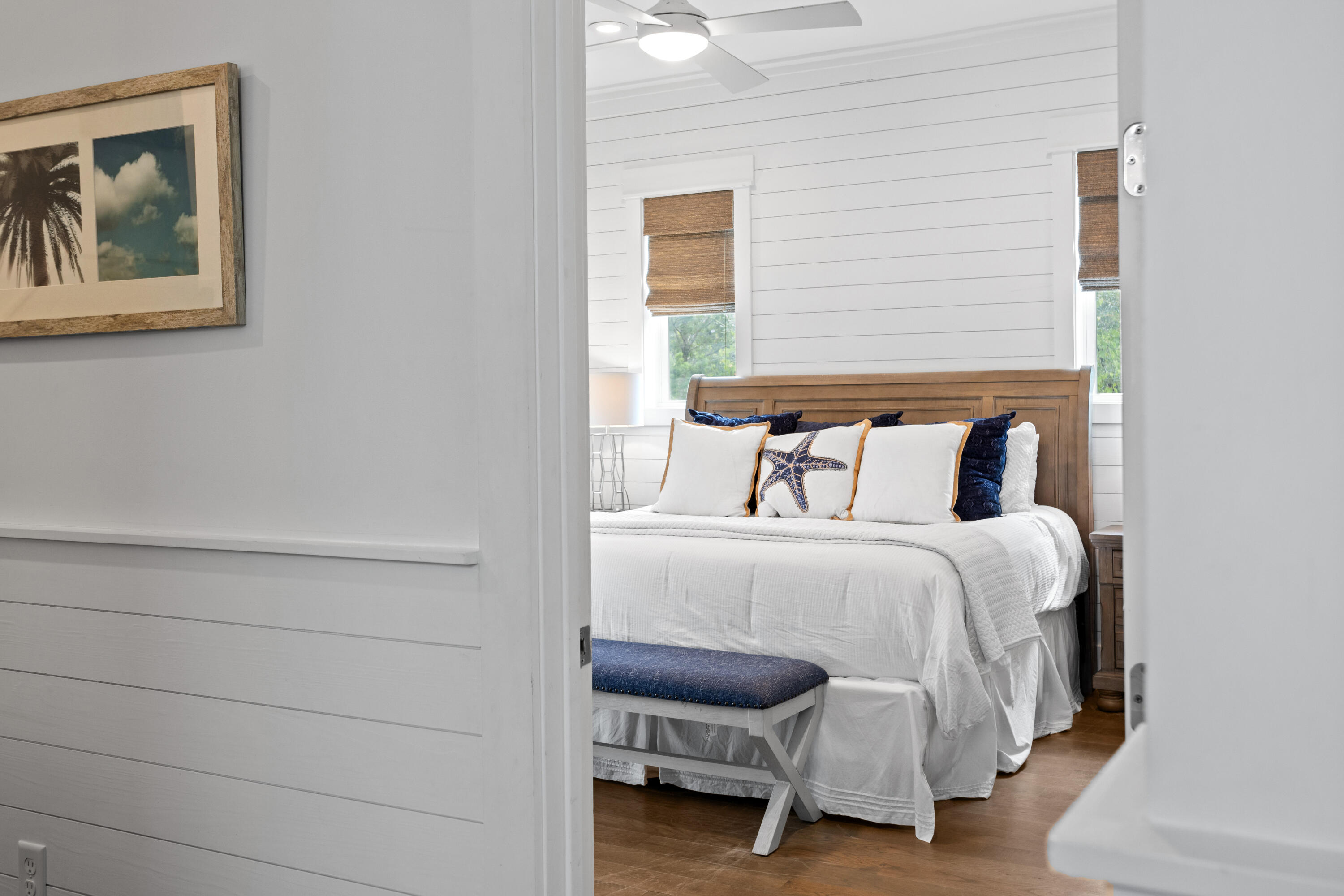 14 The Heron Cove Inlet Beach, FL 32461 - Photo 19 of 56 a bedroom with a bed and a chair