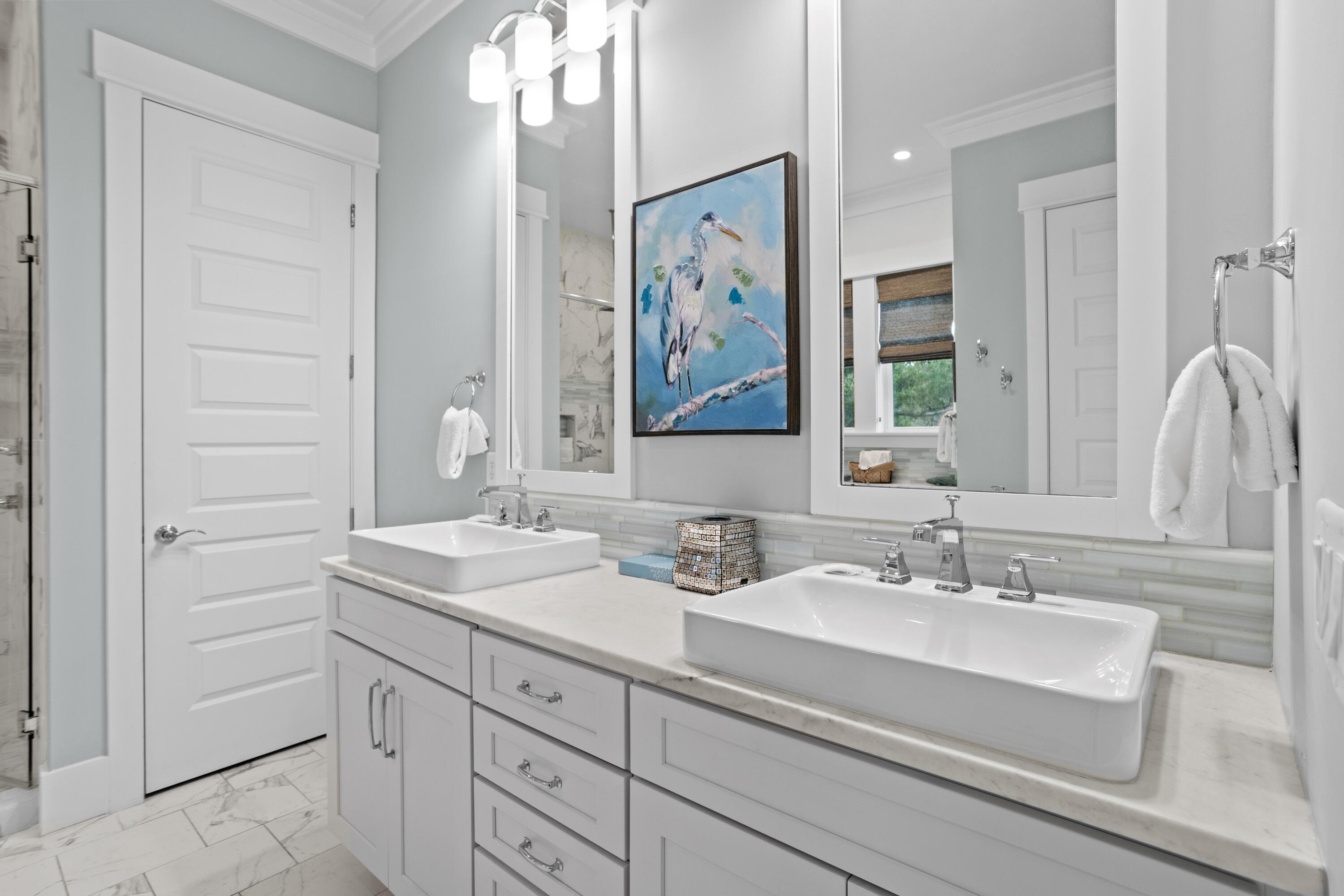 14 The Heron Cove Inlet Beach, FL 32461 - Photo 22 of 56 a bathroom with a sink and a mirror