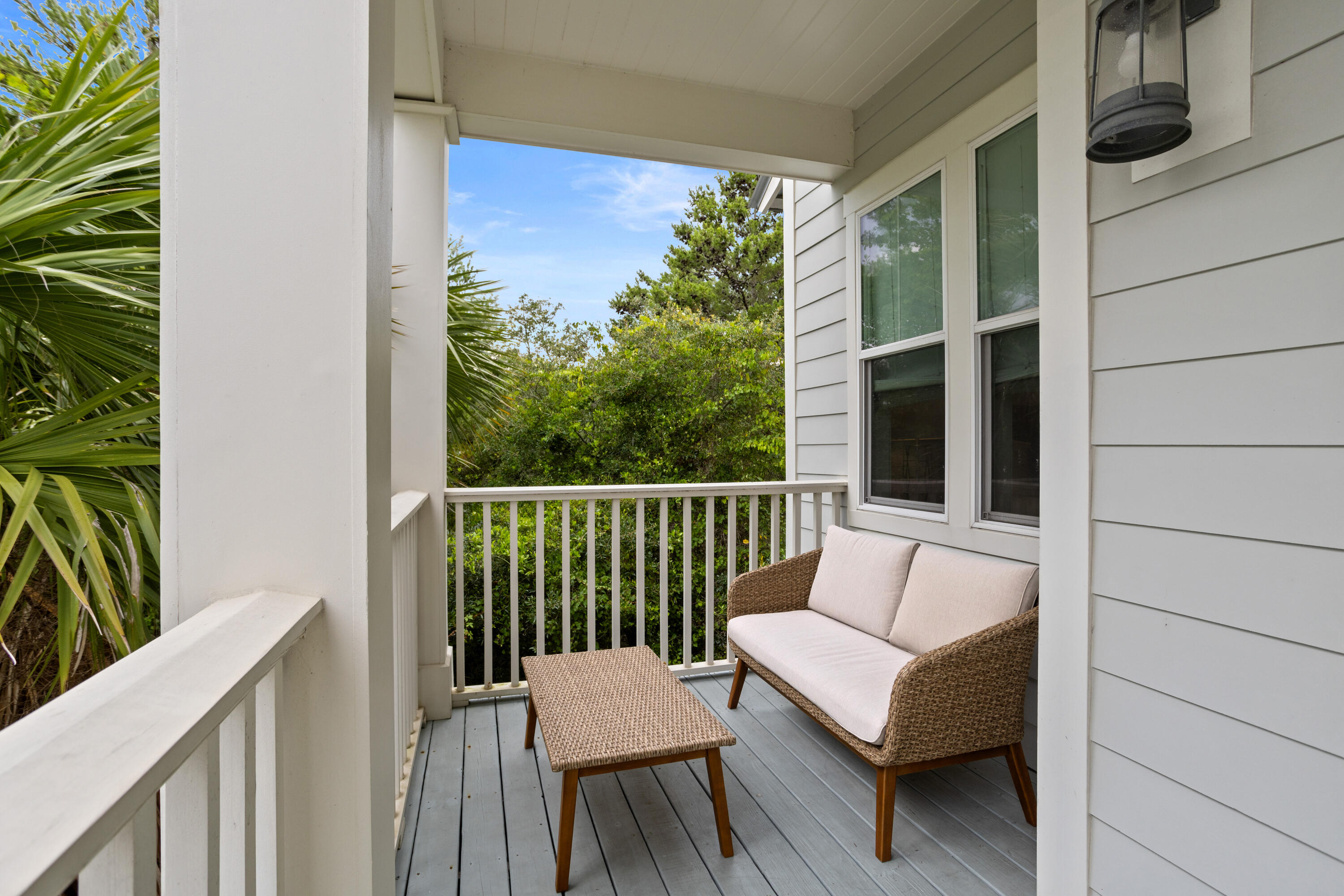 14 The Heron Cove Inlet Beach, FL 32461 - Photo 28 of 56 a view of a balcony with chair and wooden floor