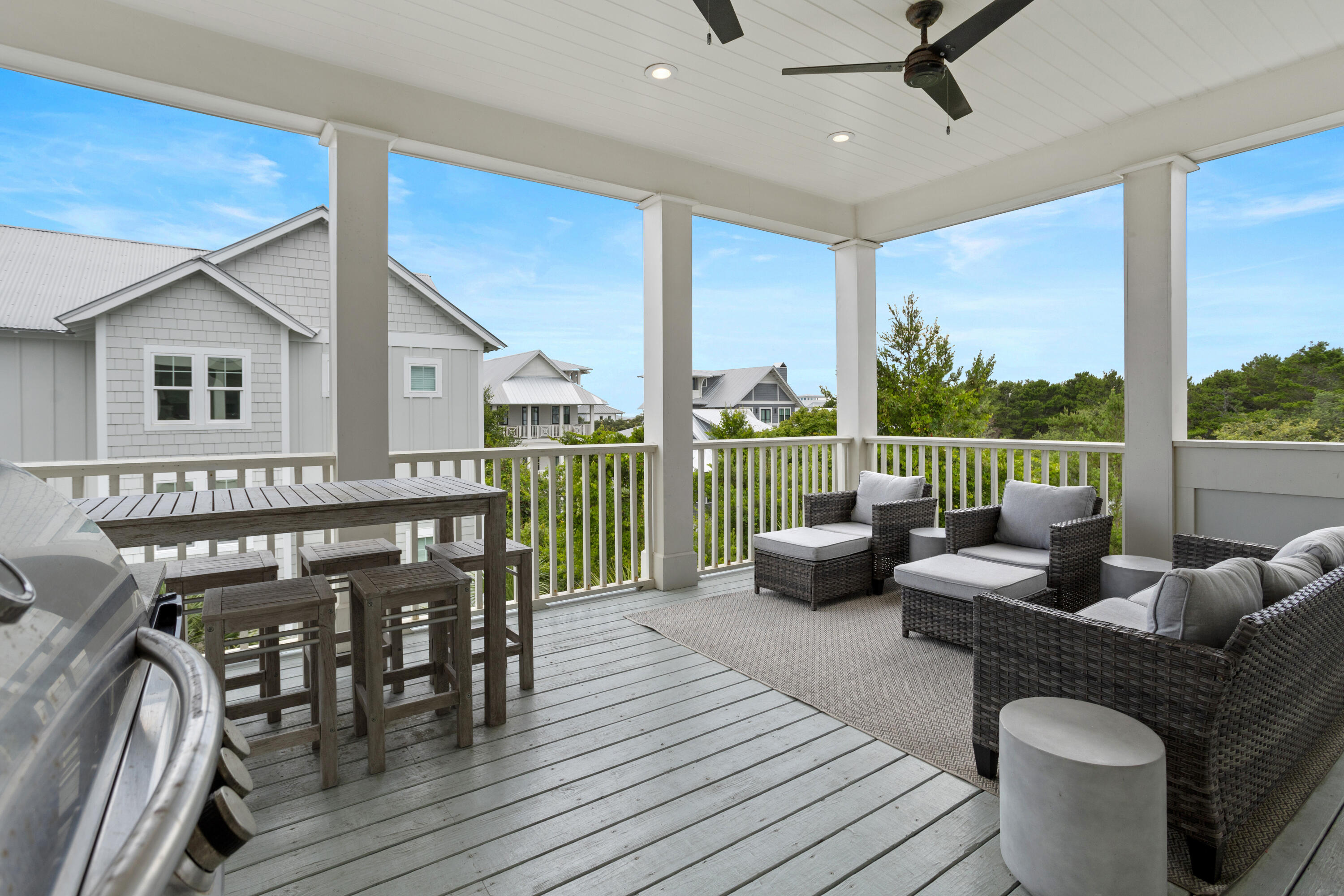 14 The Heron Cove Inlet Beach, FL 32461 - Photo 38 of 56 a living room with furniture and a floor to ceiling window