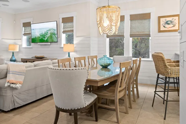 a view of staircase with railing and a rug