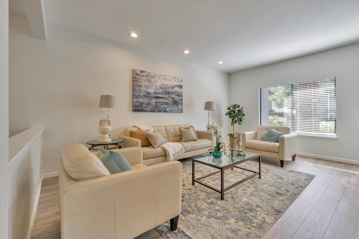 1677 Geary Road Walnut Creek, CA 94597 - Photo 1 of 38 a living room with furniture and a large window