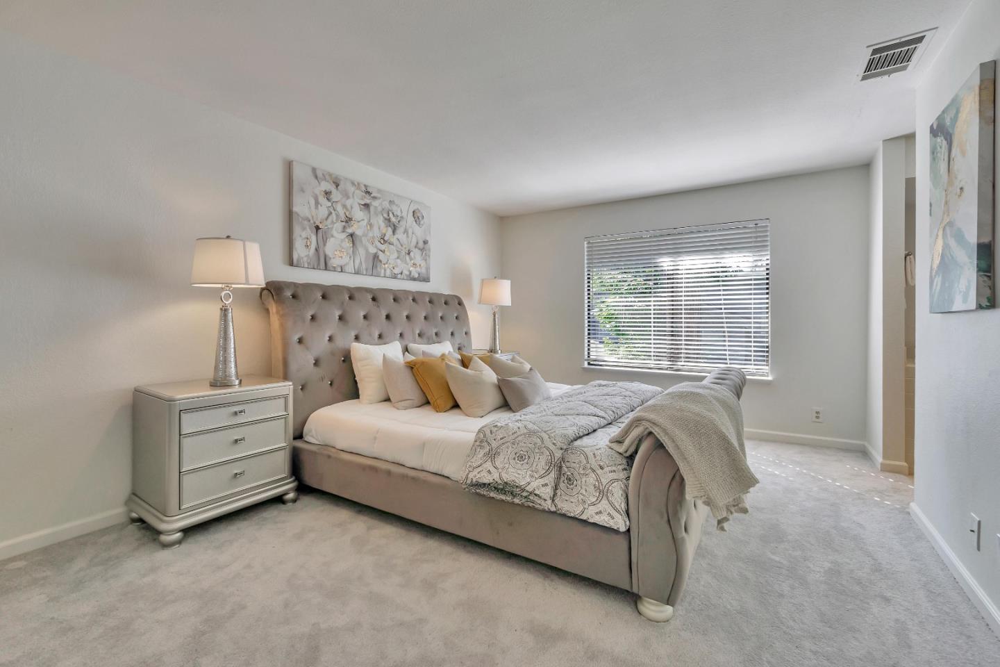 1677 Geary Road Walnut Creek, CA 94597 - Photo 11 of 38 a bed room with a bed and a window