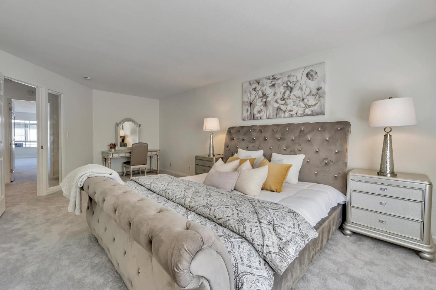 1677 Geary Road Walnut Creek, CA 94597 - Photo 13 of 38 a bedroom with a bed and lamp on dresser